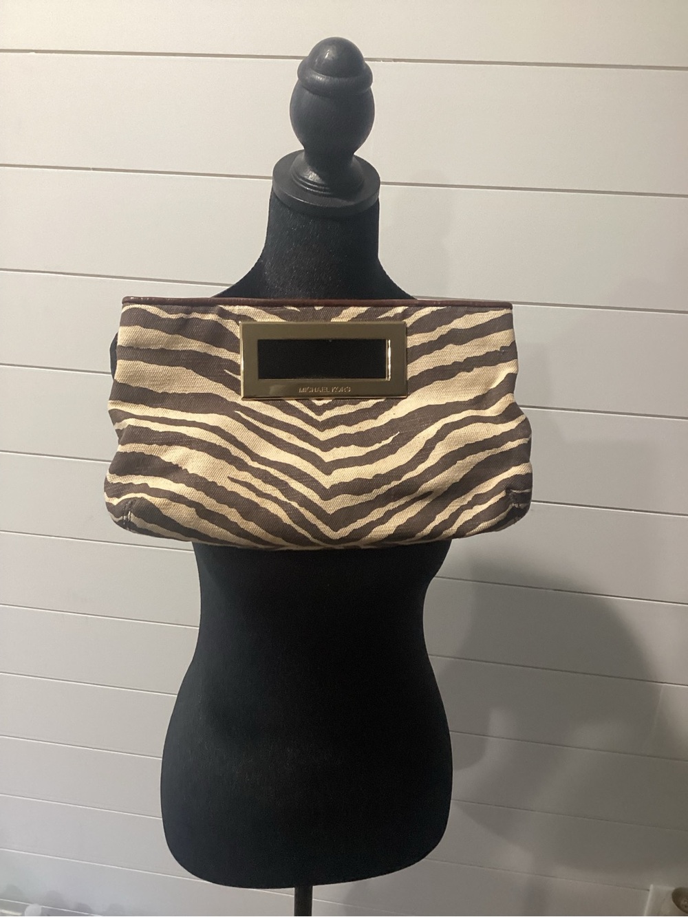 MICHAEL Michael Kors Beige and Brown Zebra-Print clutch purse.